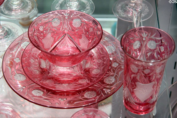 Engraved ruby-cased glass place setting (1928) by Steuben Glass at Corning Museum of Glass. Corning, NY.