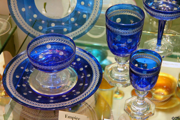 Engraved blue Empire style glass place setting (1932) by Steuben Glass at Corning Museum of Glass. Corning, NY.
