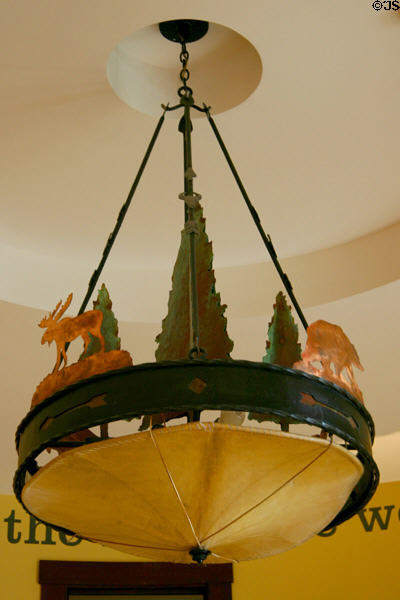 Wrought iron ceiling lamp with moose at Rockwell Museum of Art. Corning, NY.