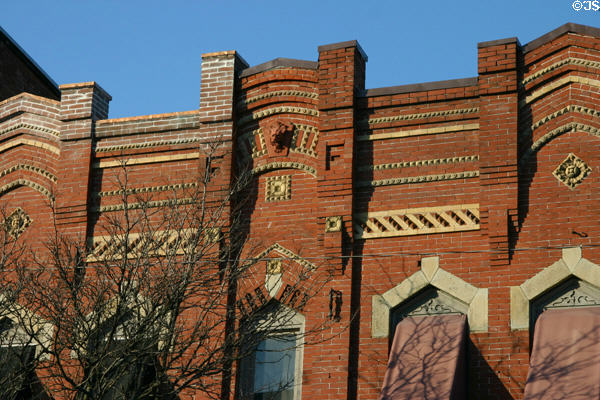 Victorian Gothic brick building on East Market St. Corning, NY.