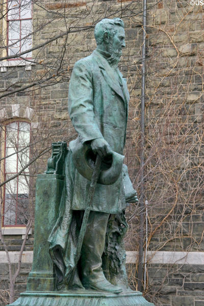 Statue of Ezra Cornell (1807-54) facing Arts Quad of Cornell Campus. Ithaca, NY.