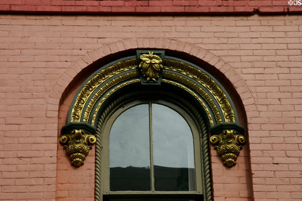 Window surround details on Second Empire commercial building (158 E State St.). Ithaca, NY.