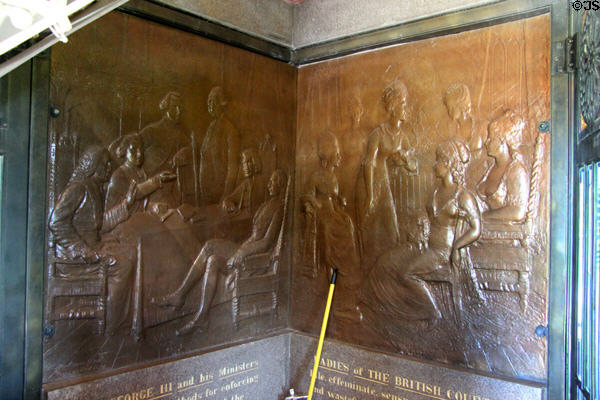 "George III & his ministers devising methods for enforcing the unjust taxation of the American colonists" & "Ladies of the British court. Idle, effeminate, sensuous, extravagant & wasteful; demanding for their support the taxing of the colonists" bronze relief (1885) by J.C. Markham in Saratoga Monument. Schuylerville, NY.