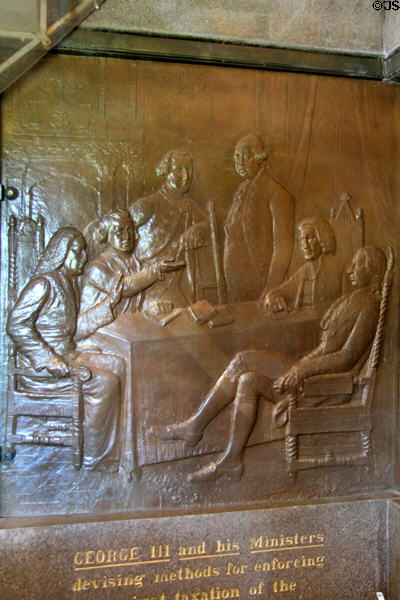 "George III & his ministers devising methods for enforcing the unjust taxation of the American colonists" bronze relief (1885) by J.C. Markham in Saratoga Monument. Schuylerville, NY.