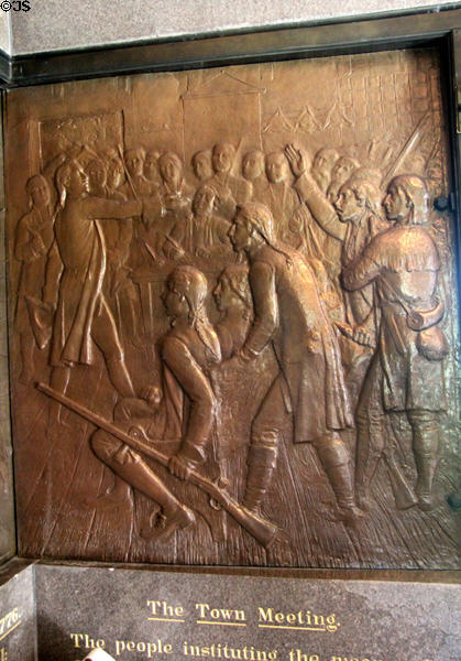 "Town meeting. The people instituting the means of self-government for the protection of their natural rights" bronze relief (1885) by J.C. Markham in Saratoga Monument. Schuylerville, NY.