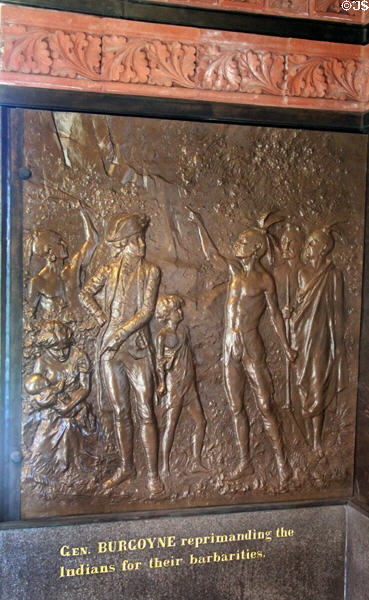 "Gen. Burgoyne reprimanding the Indians for their barbarities" bronze relief (1885) by J.C. Markham in Saratoga Monument. Schuylerville, NY.