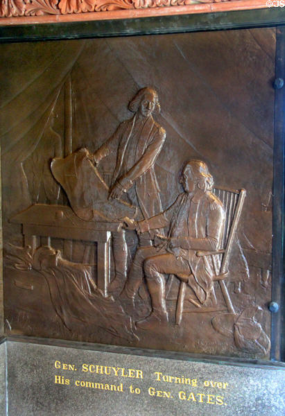 "General Schuyler turning over his command to Gen. Gates" bronze relief (1885) by J.C. Markham in Saratoga Monument. Schuylerville, NY.