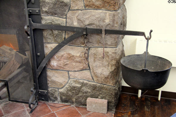 Cauldron beside fireplace at Roycroft Print Shop. East Aurora, NY.