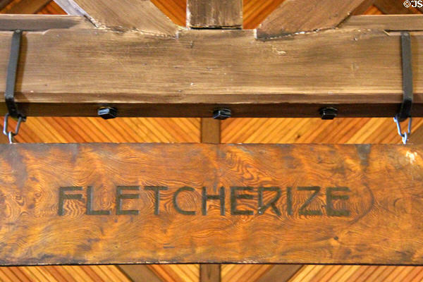 Restaurant beams urges diners to Fletcherize (chew each mouthful of food 32 times) at Roycroft Inn. East Aurora, NY.