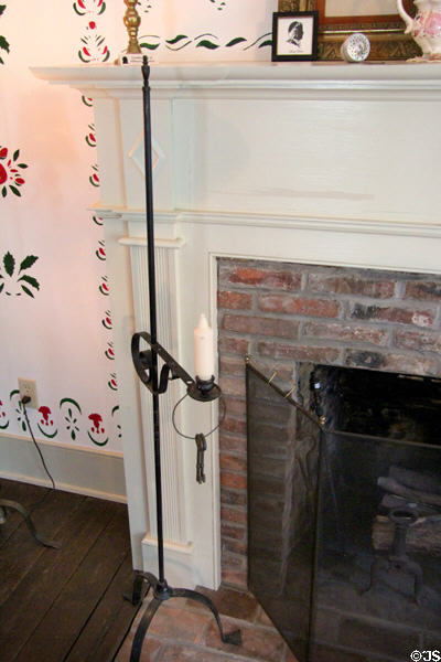 Adjustable-height candlestick beside fireplace at Millard Fillmore House. East Aurora, NY.