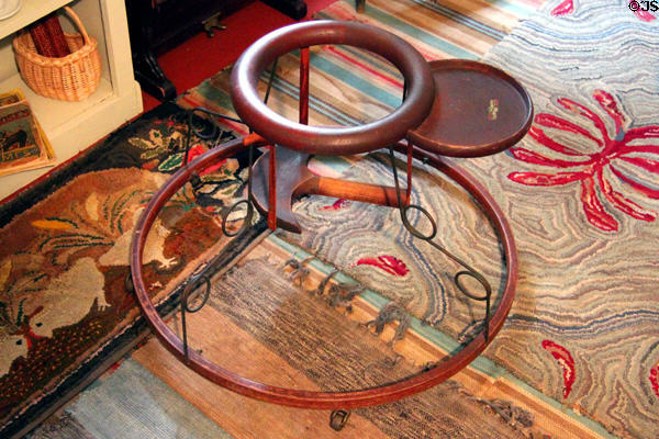 Wheeled walking trainer for child at Millard Fillmore House. East Aurora, NY.