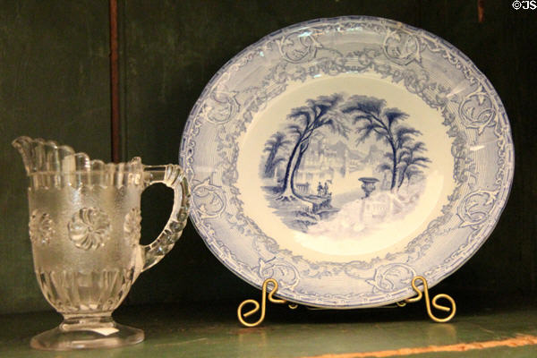 Pressed glass pitcher & blue transfer printed china plate at Millard Fillmore House. East Aurora, NY.