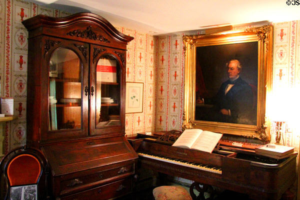 Parlor extension with desk, piano & painting of Fillmore at Millard Fillmore House. East Aurora, NY.