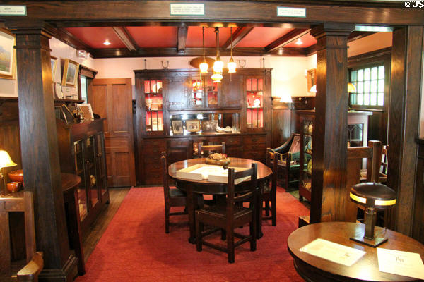 Dining room with Arts & Crafts wooden furniture & cabinets at Elbert Hubbard Roycroft Museum. East Aurora, NY.
