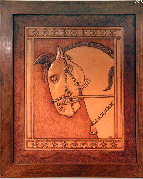 Horse image in modeled leather work by George Scheide Mantel at Elbert Hubbard Roycroft Museum. East Aurora, NY.