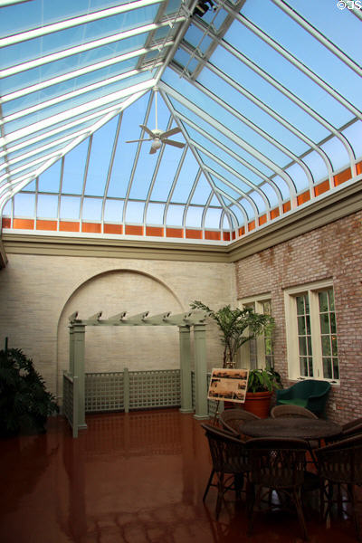 Green house opening into garden at Eastman House. Rochester, NY.
