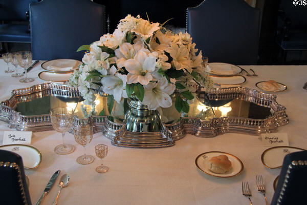 Floral silver centerpiece on dining table at Eastman House. Rochester, NY.