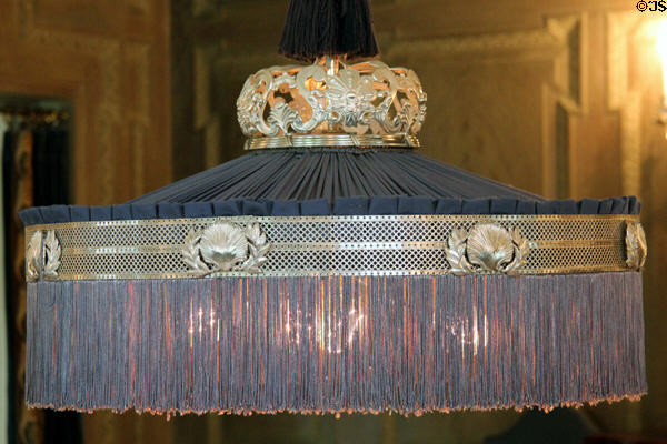 Fringed hanging black silk lampshade with silver fittings at Eastman House. Rochester, NY.