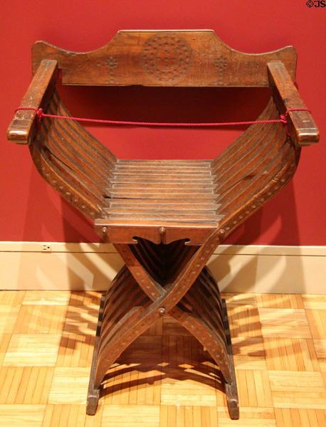 Italian walnut Savonarola Chair (c1500) at Memorial Art Gallery. Rochester, NY.
