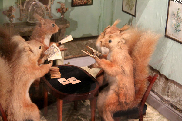 Toy squirrels playing cards at The Strong National Museum of Play. Rochester, NY.