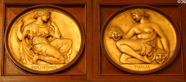 Relief roundels showing Polyhymnia & Thalia muses on Rush Rhees Library facade (1927) at University of Rochester. Rochester, NY.