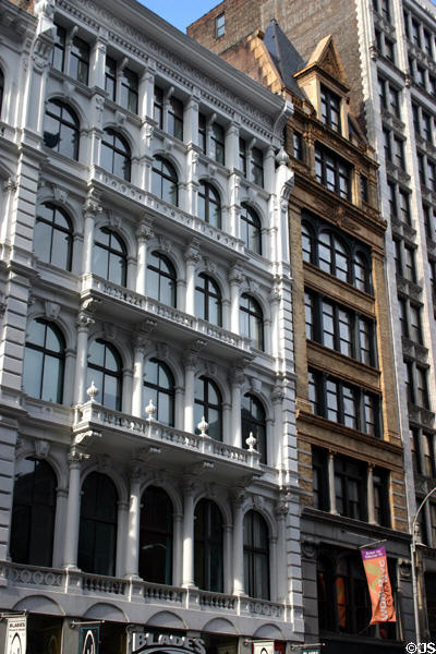 Romanesque building (659 Broadway) & brown Chateau-style (1891) building (661 Broadway). New York, NY.