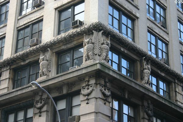 Stone owls on Merchant's building (693 Broadway at 4th St.). New York, NY.
