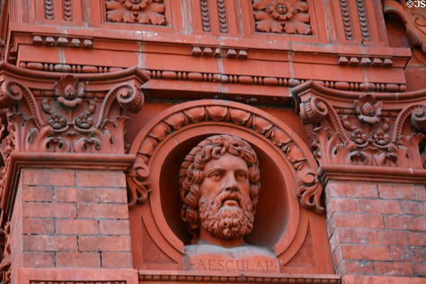 Terra cotta bust of Aesculap on Deutsches Dispensary. New York, NY.