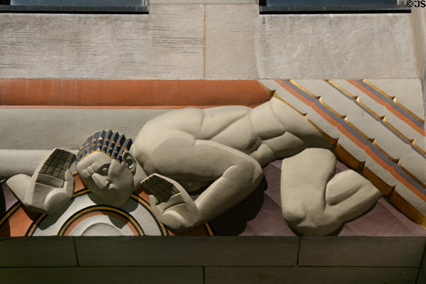 Art Deco figure of man representing sound by Lee Lawrie on GE Building of Rockefeller Center. New York, NY.