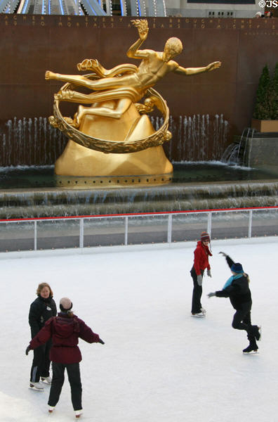 Prometheus over ice skaters at Rockefeller Center. New York, NY.