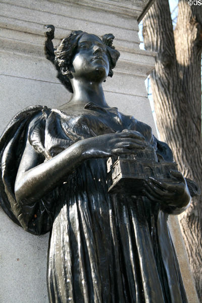 Bronze female figure carrying building (1898) by Daniel Chester French at Richard Morris Hunt's memorial in Central Park. New York, NY.