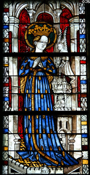 Virgin Mary in robe with wheat stained glass (c1440) from the church at Boppard-am-Rhein at The Cloisters. New York, NY.