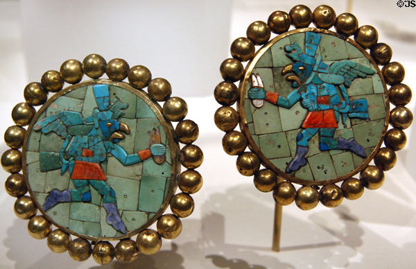 Moche gold & inlaid earflares, Peru (3rd-7thC) at Metropolitan Museum of Art. New York, NY.