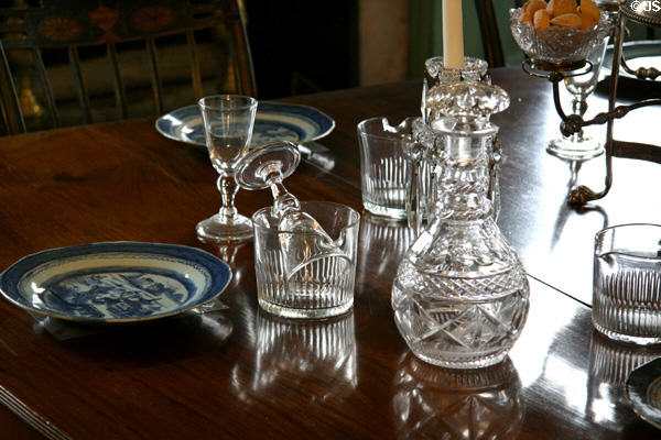 Dining room table with Chinese Cantonware plates & wine rinsers to clean wine glasses between courses at Morris-Jumel Mansion. New York, NY.