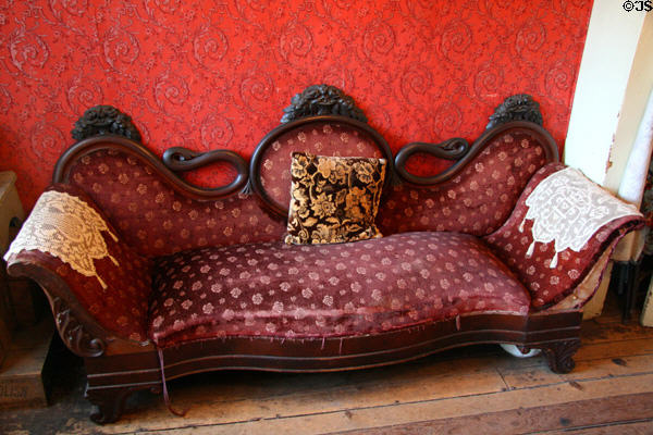 Sofa in front room of Lithuanian family (Rogarshevsky Apartment 1901) at Tenement Museum. New York, NY.