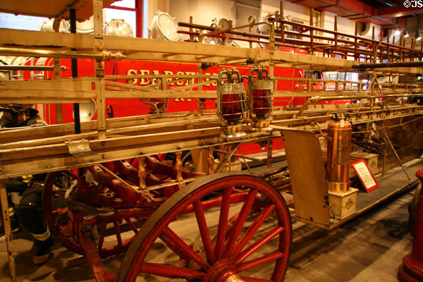 Details of horse-drawn ladder truck (1882) by Gleason & Bailey of Seneca Falls at New York Fire Museum. New York, NY.