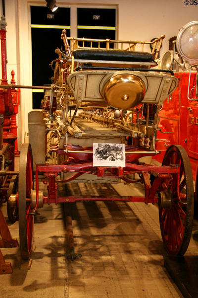 Seat & bell of horse-drawn ladder truck (1882) by Gleason & Bailey of Seneca Falls at New York Fire Museum. New York, NY.