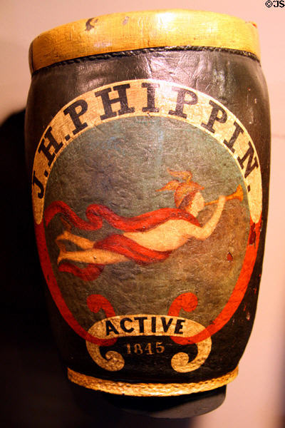 Painted leather fire bucket (1845) labeled J.H. Phippin at New York Fire Museum. New York, NY.