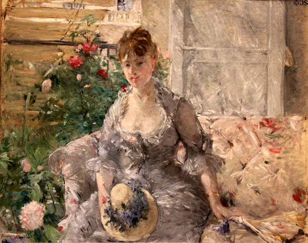 Young Woman Seated on a Sofa portrait (c1879) by Berthe Morisot at Metropolitan Museum of Art. New York, NY.