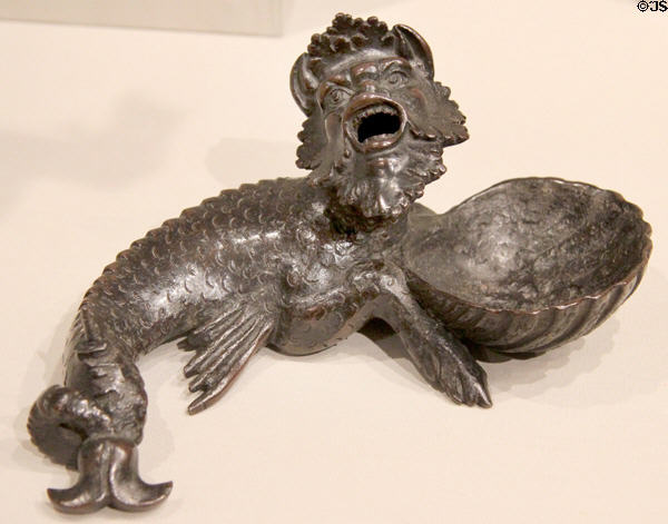 Sea monster with shell inkwell & candle pricket bronze statuette (early 16thC) by workshop of Severo Calzetta da Ravenna in Padua at Metropolitan Museum of Art. New York, NY.