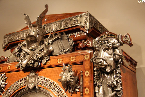Detail of silver mounts on veneered armoire (1867) by Jean Brandely, Charles-Guillaume Diehl & Emmanuel Frémiet of Paris (made for Paris Exposition Universelle of 1867) at Metropolitan Museum of Art. New York, NY.