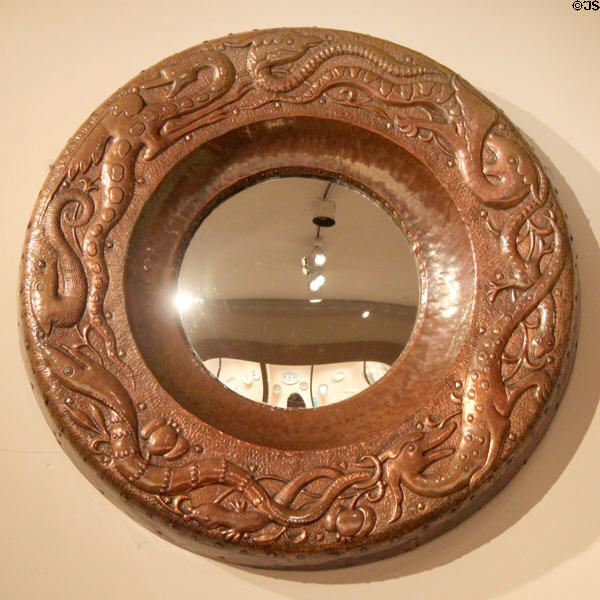 Repoussé copper mirror frame with mythical dragons (1899) by John Pearson at Metropolitan Museum of Art. New York, NY.