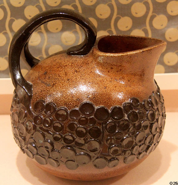 Stoneware jug (1900-2) by Richard Riemerschmid for Reinhold Merkelback of Germany at Metropolitan Museum of Art. New York, NY.