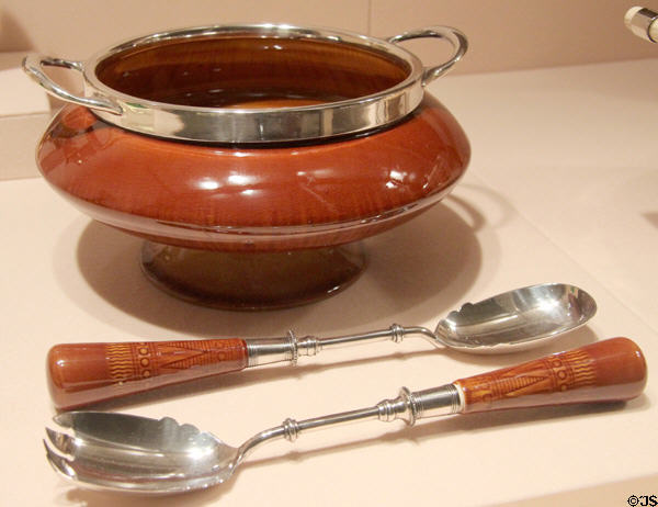 Earthenware & silver salad bowl & servers (c1879-82) by Christopher Dresser made by Linthorpe Pottery of Middlesborough, England at Metropolitan Museum of Art. New York, NY.