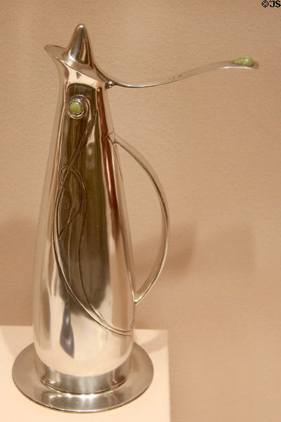 Silver claret jug (1900-1) by Archibald Knox made by Haseler & Co. for retailer Liberty & Co. at Metropolitan Museum of Art. New York, NY.