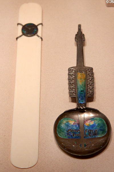 Ivory paper knife (1907-8) & enameled silver spoon (1902) both by Archibald Knox made by Haseler & Co. for retailer Liberty & Co. at Metropolitan Museum of Art. New York, NY.