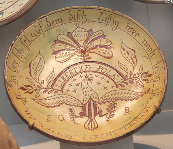 Redware sgraffito plate noting electoral victory of James Polk (1846) by Samuel Troxel of Upper Hanover Township, PA at Metropolitan Museum of Art. New York, NY.