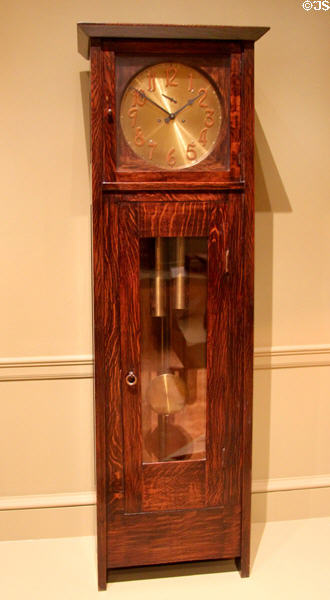 Tall clock (1902-3) by Gutave Stickley made by Craftsman Workshops of Eastwood, NY at Metropolitan Museum of Art. New York, NY.