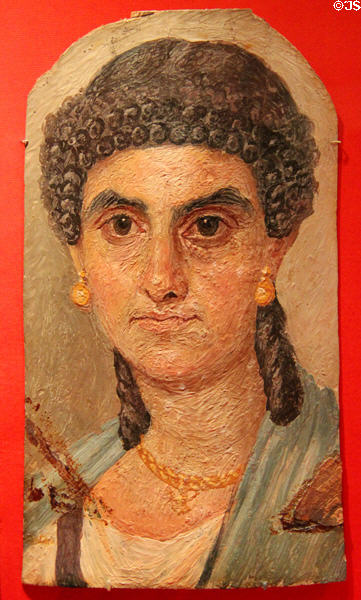 Greco-Romano-Egyptian mummy portrait of woman in blue mantle (54-68 CE) at Metropolitan Museum of Art. New York, NY.