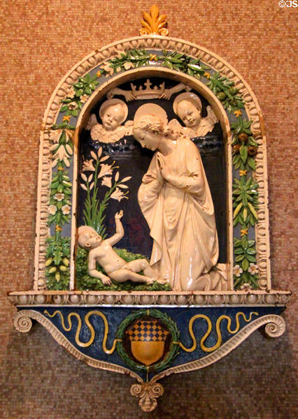Glazed terracotta Adoration of the Child (after 1477) by Andrea della Robbia of Florence at Morgan Library. New York City, NY.